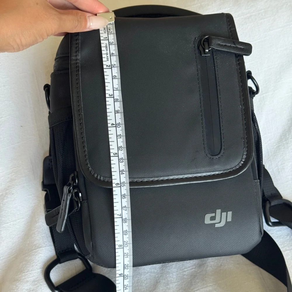 DJI Mavic Black Messenger Bag with Adjustable Strap and Minimalist Design